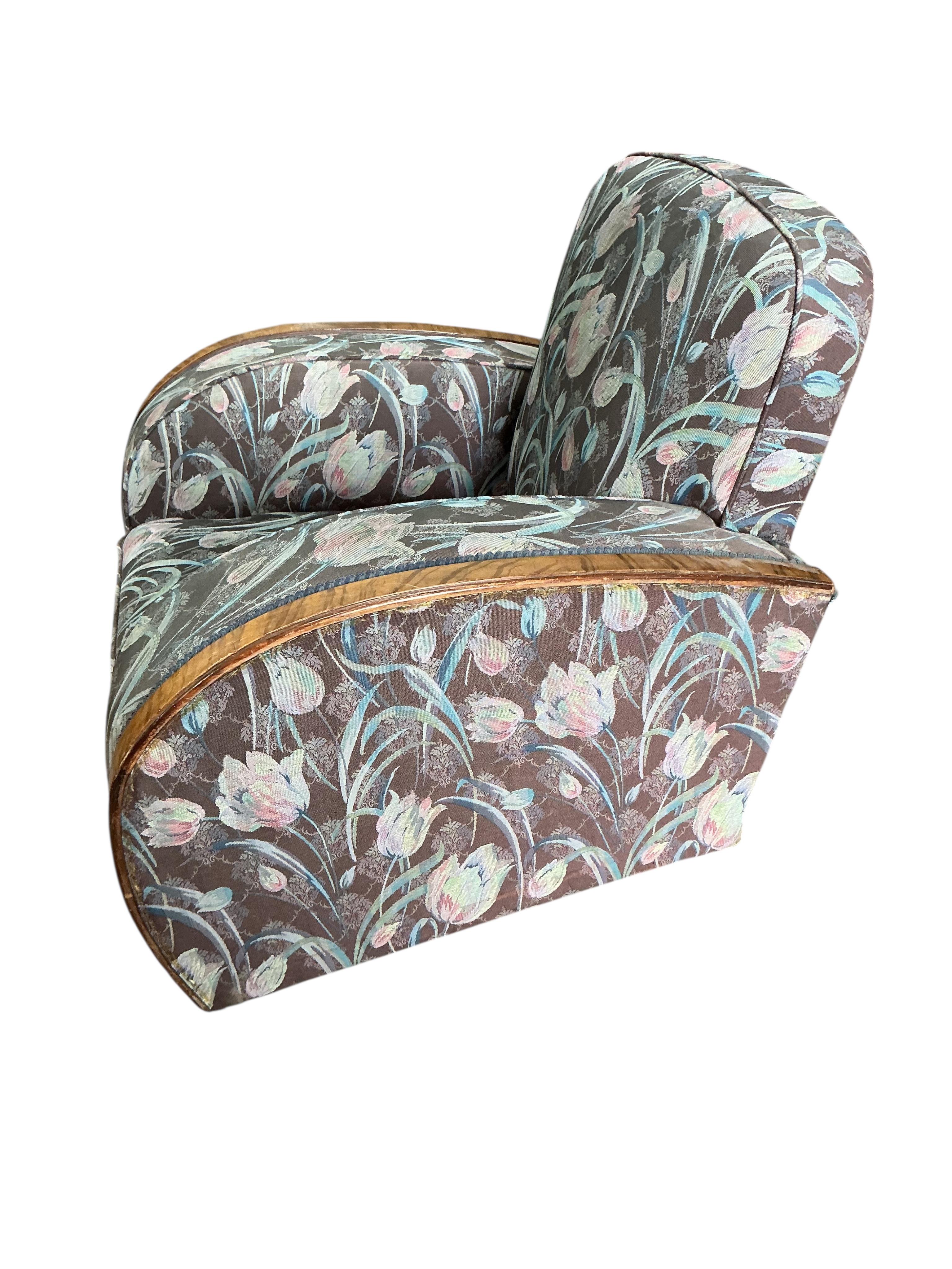 An Art Deco walnut and simulated walnut armchair, width 87cm, depth 82cm, height 78cm